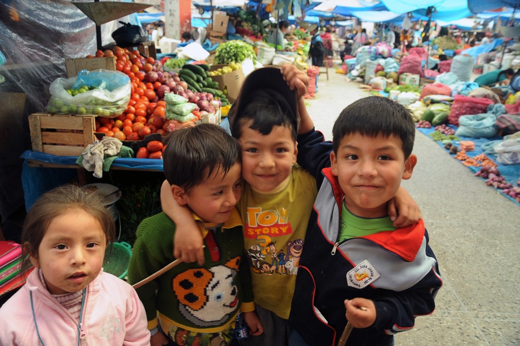 Kids in the Market The boy on the right hand side, pulling up his friend's hat is the one who approached me!
